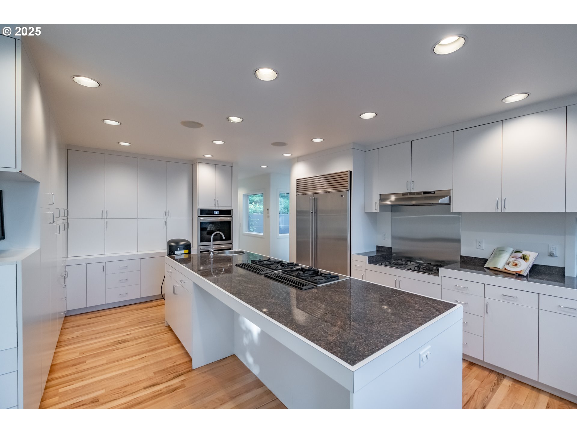 2790 Northwest Sulphur Springs Road Corvallis, OR 97330 - Photo 23 of 48 a kitchen with stainless steel appliances granite countertop a sink a stove a refrigerator and a oven