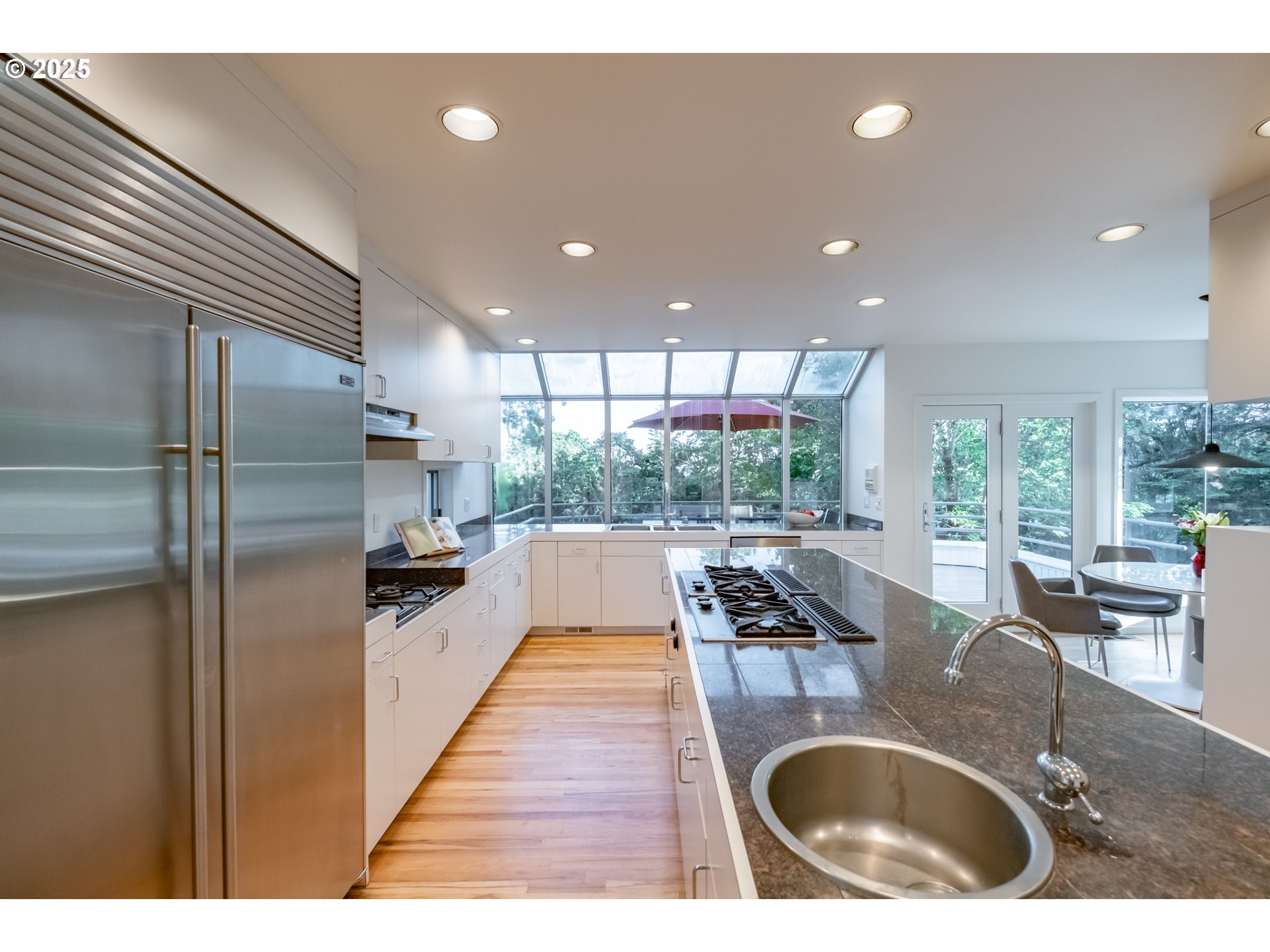 2790 Northwest Sulphur Springs Road Corvallis, OR 97330 - Photo 28 of 48 a kitchen with stainless steel appliances granite countertop a sink a stove and a refrigerator