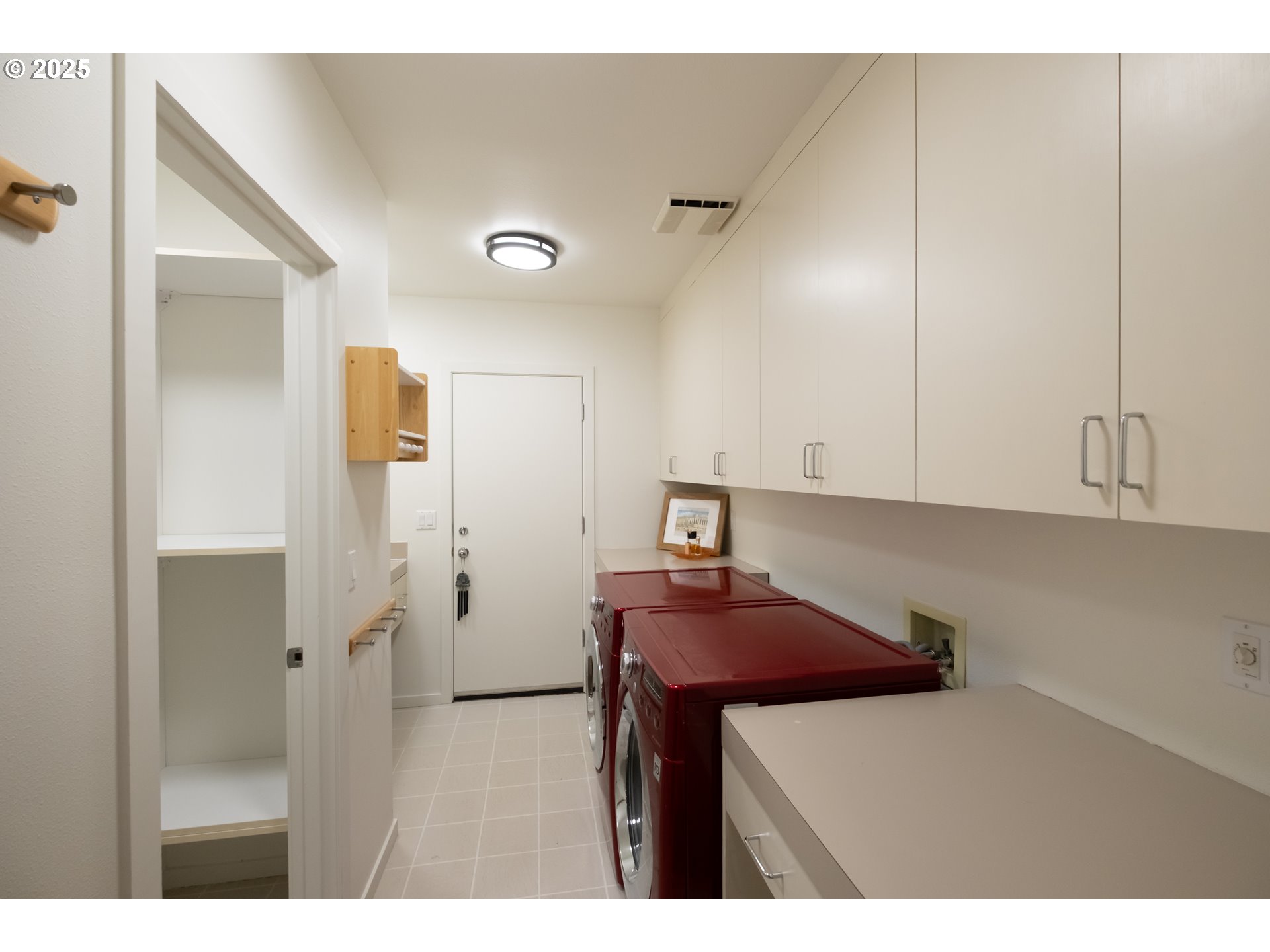 2790 Northwest Sulphur Springs Road Corvallis, OR 97330 - Photo 46 of 48 a kitchen with stainless steel appliances a refrigerator and cabinets