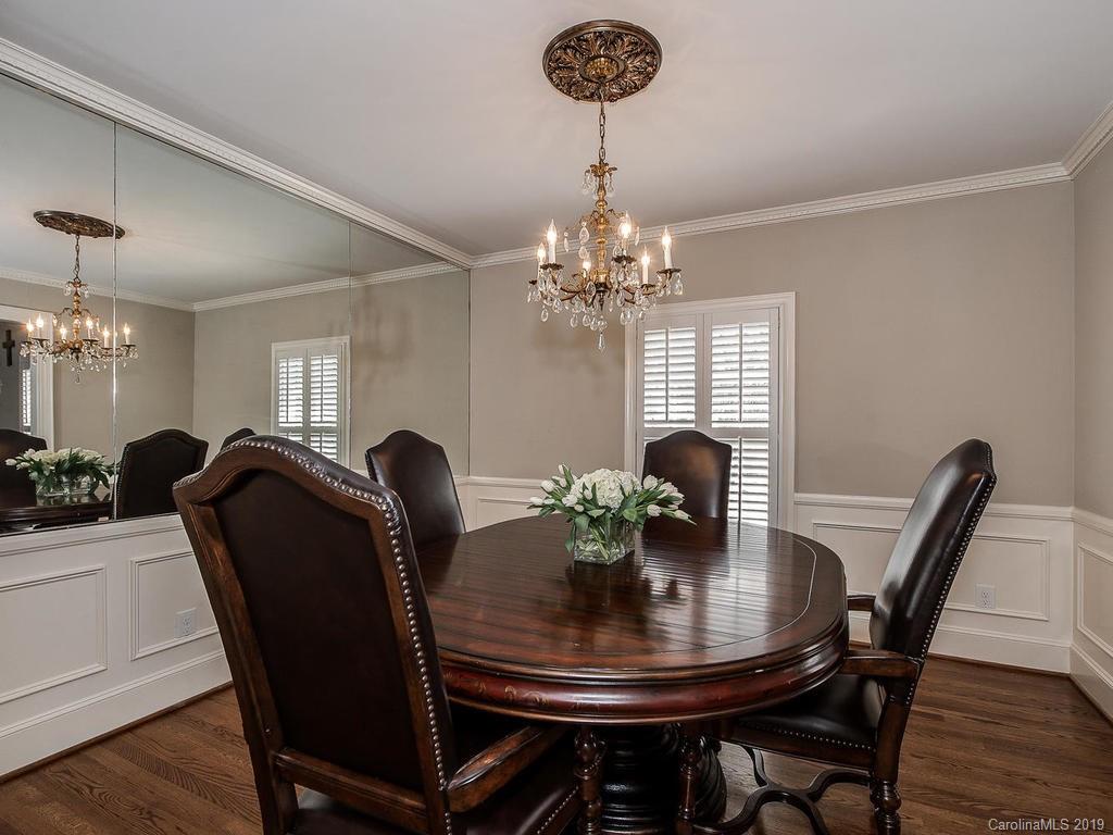 3108 Wickersham Road Charlotte, NC 28211 - Photo 5 of 34 a view of a dining room with furniture and wooden floor
