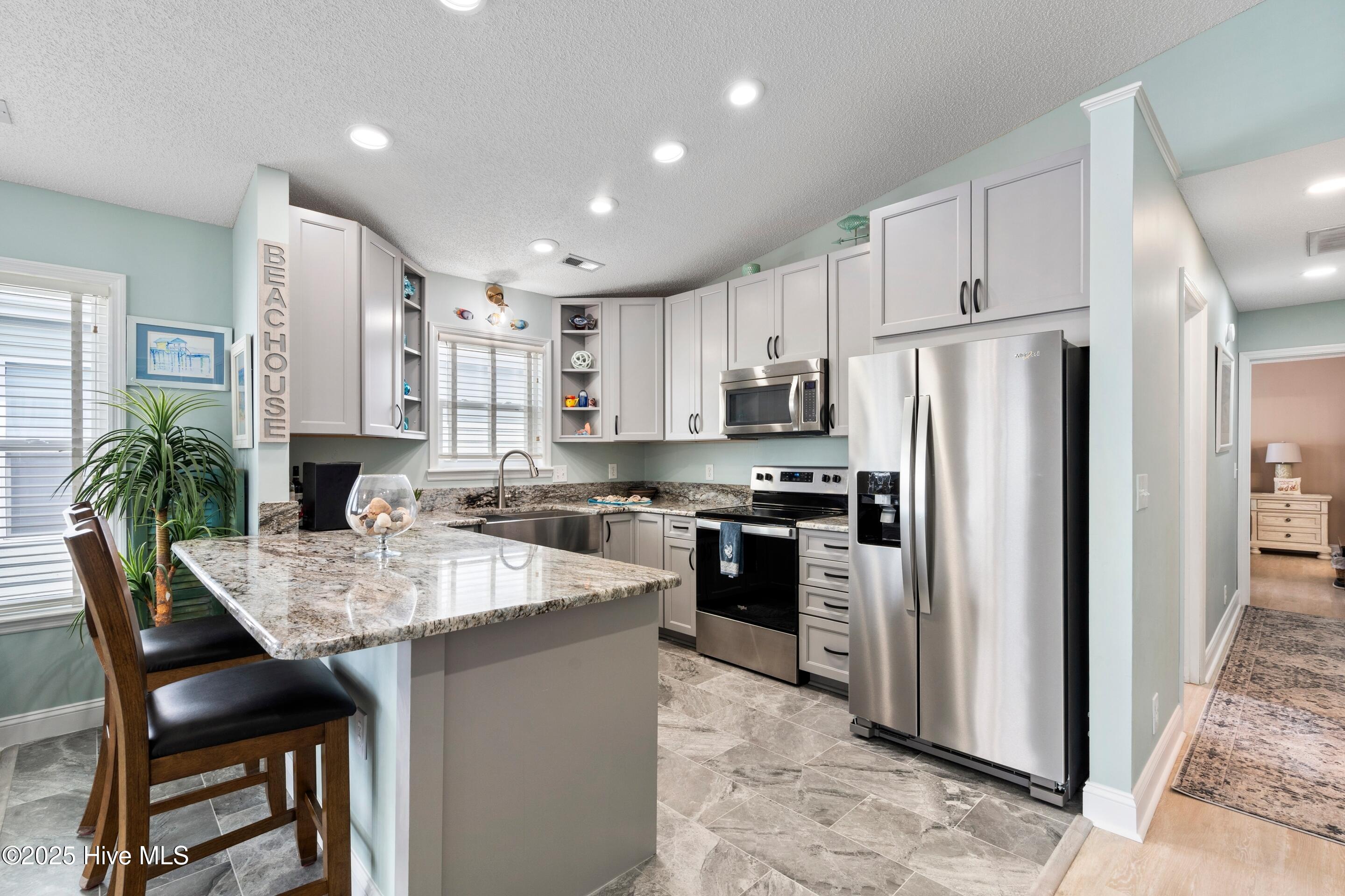 419 27th Street, Unit D Sunset Beach, NC 28468 - Photo 9 of 43 Kitchen