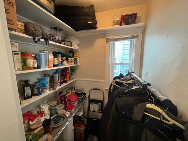 a room with storage and utility