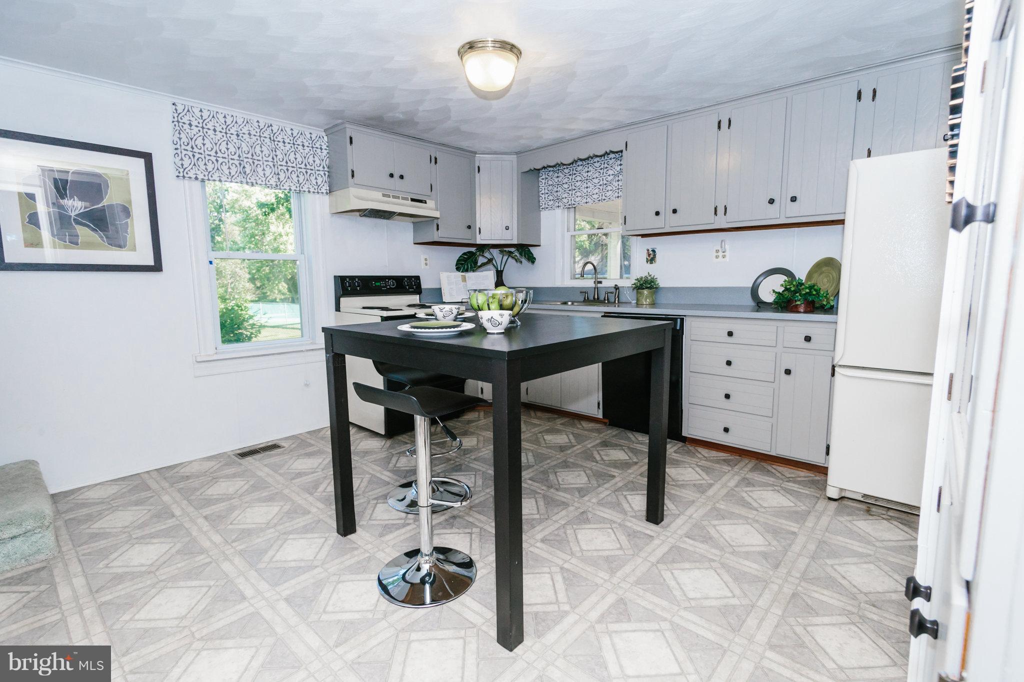 2056 Flag Marsh Road Mount Airy, MD 21771 - Photo 10 of 26 Spacious kitchen boasts chic grey cabinetry