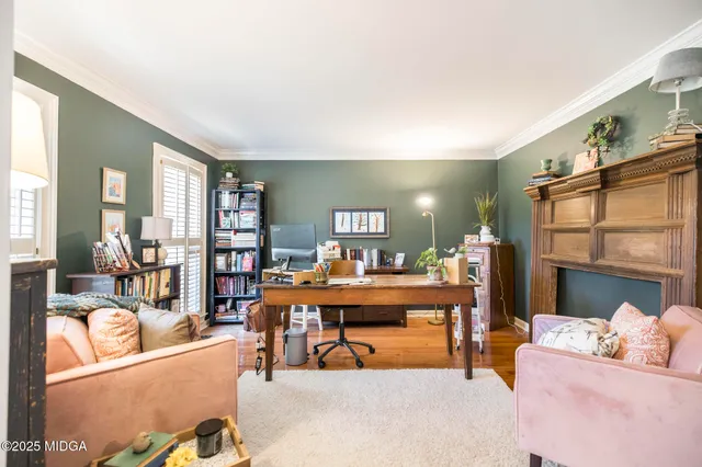 a kitchen with stainless steel appliances granite countertop a sink a counter space and a window
