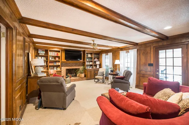 a kitchen with stainless steel appliances granite countertop a stove and a microwave