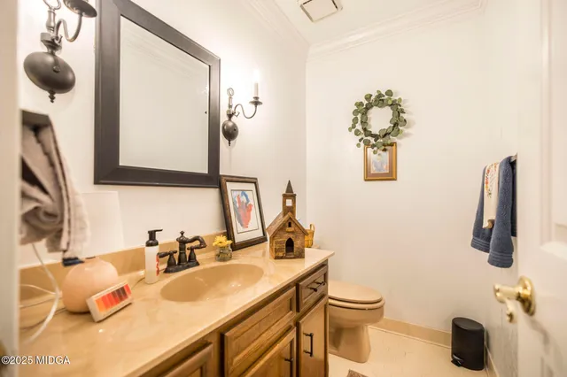 a living room with furniture rug and wooden floor