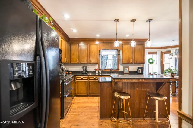 a bathroom with a sink a mirror and a toilet