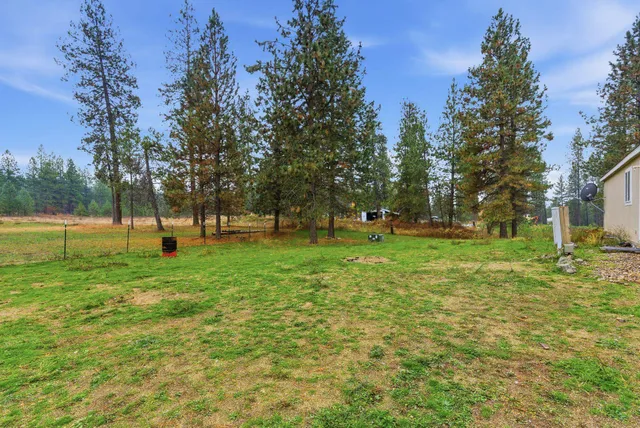 $399,500 | 38609 North Madison Road, Elk, WA 99009