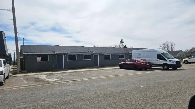 a car parked in front of a house