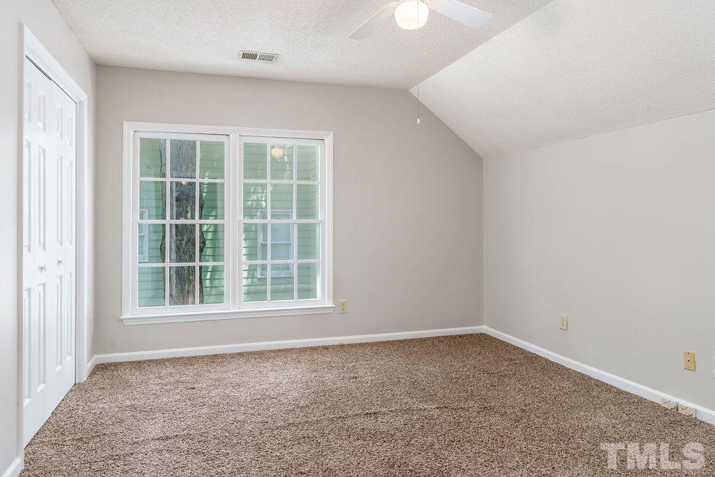 3433 Singleleaf Lane Raleigh, NC 27616 - Photo 22 of 28 an empty room with a window