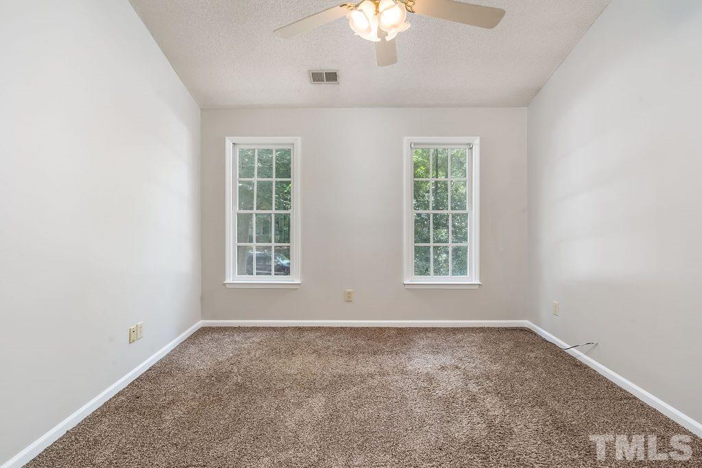 3433 Singleleaf Lane Raleigh, NC 27616 - Photo 24 of 28 an empty room with a window