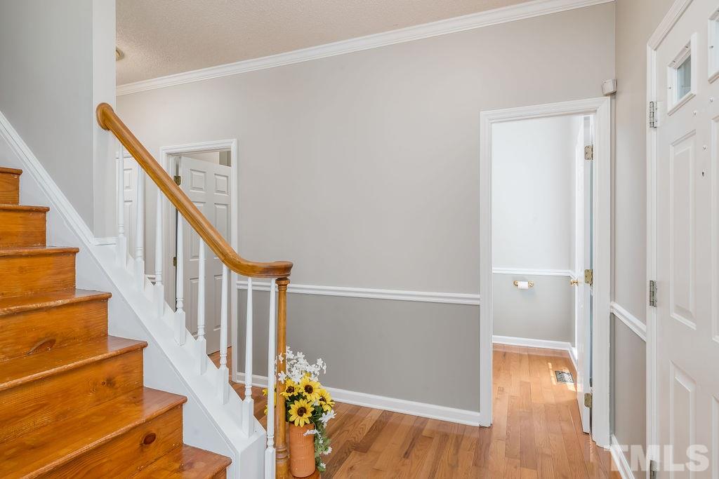3433 Singleleaf Lane Raleigh, NC 27616 - Photo 4 of 28 a view of entryway with wooden floor