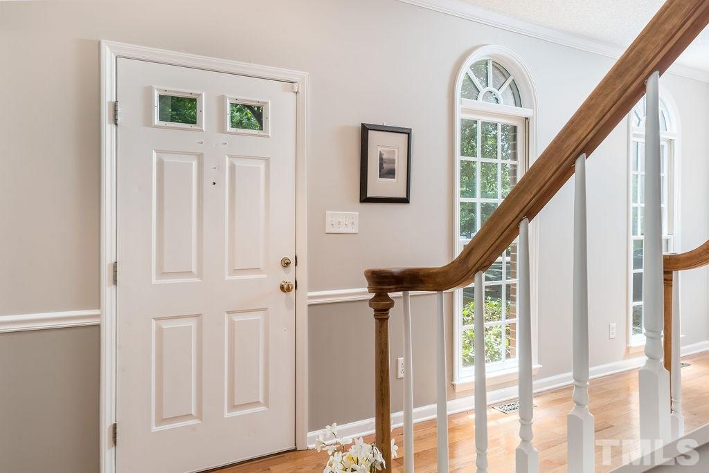 3433 Singleleaf Lane Raleigh, NC 27616 - Photo 6 of 28 a view of an entryway with staircase