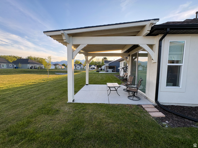 412 West 3025th Street South Logan, UT 84321 - Photo 9 of 34 View of patio featuring a residential view