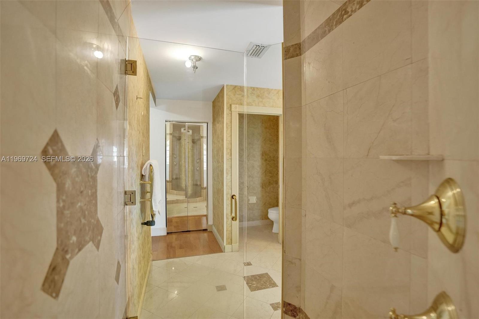 17431 Southwest 35th Street Miramar, FL 33029 - Photo 11 of 61 a bathroom with a shower and a sink