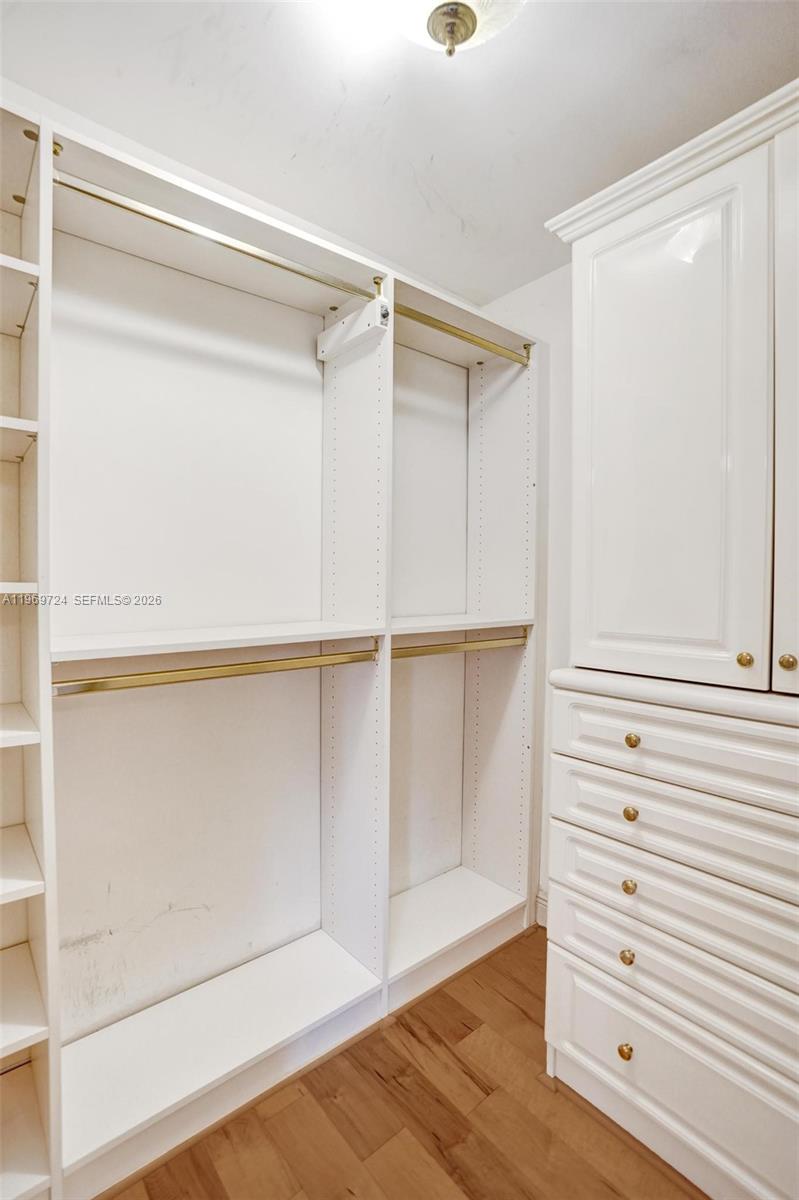 17431 Southwest 35th Street Miramar, FL 33029 - Photo 18 of 61 a view of walk in closet with empty racks