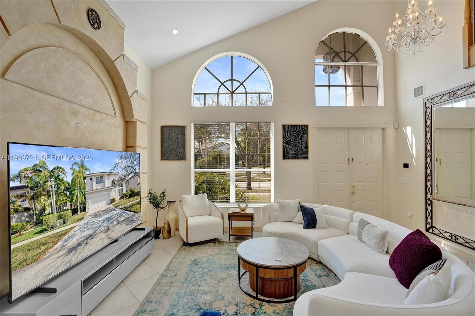 17431 Southwest 35th Street Miramar, FL 33029 - Photo 31 of 61 a living room with furniture and a large window
