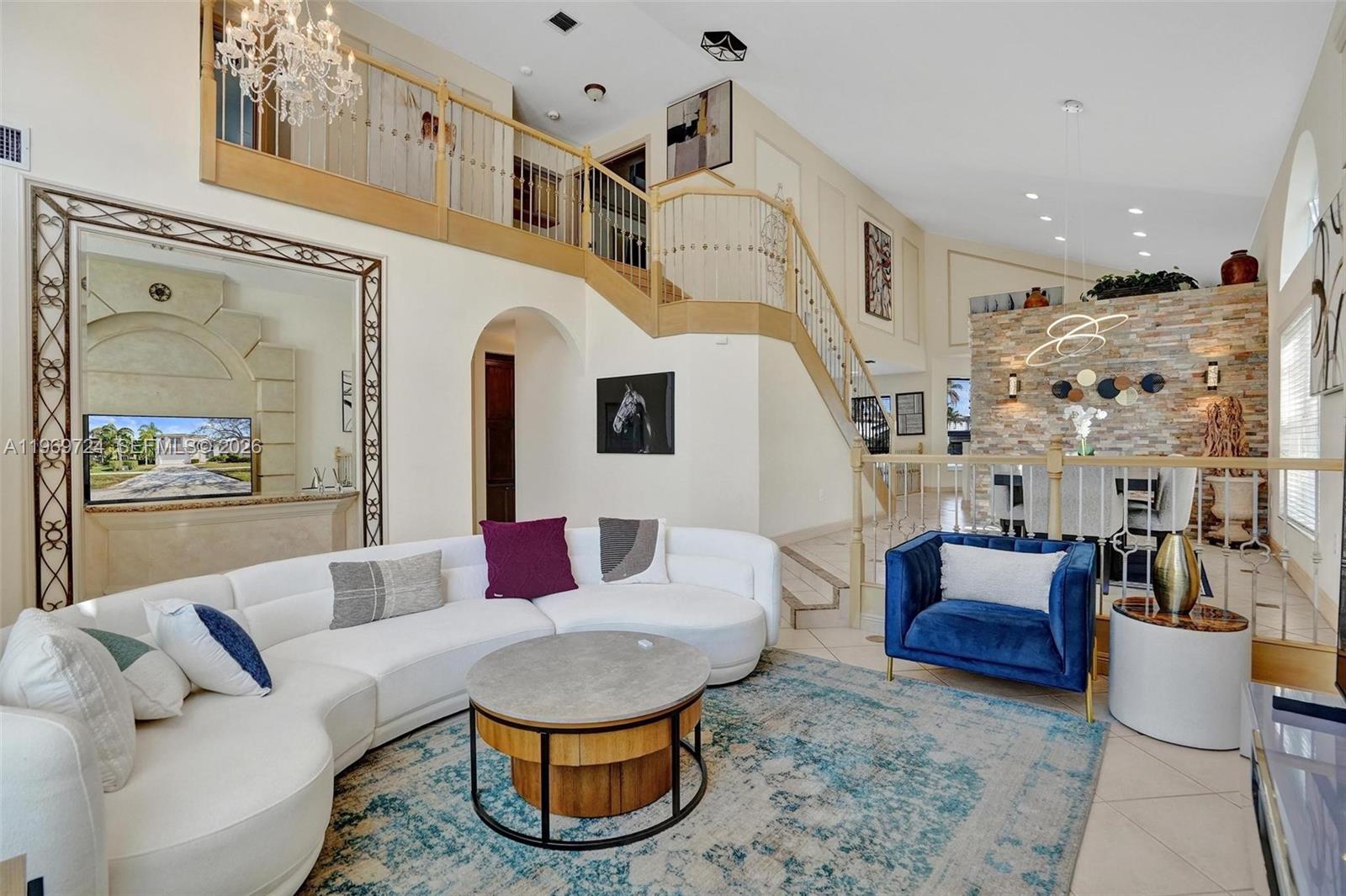 17431 Southwest 35th Street Miramar, FL 33029 - Photo 32 of 61 a living room with fireplace furniture and a wooden floor