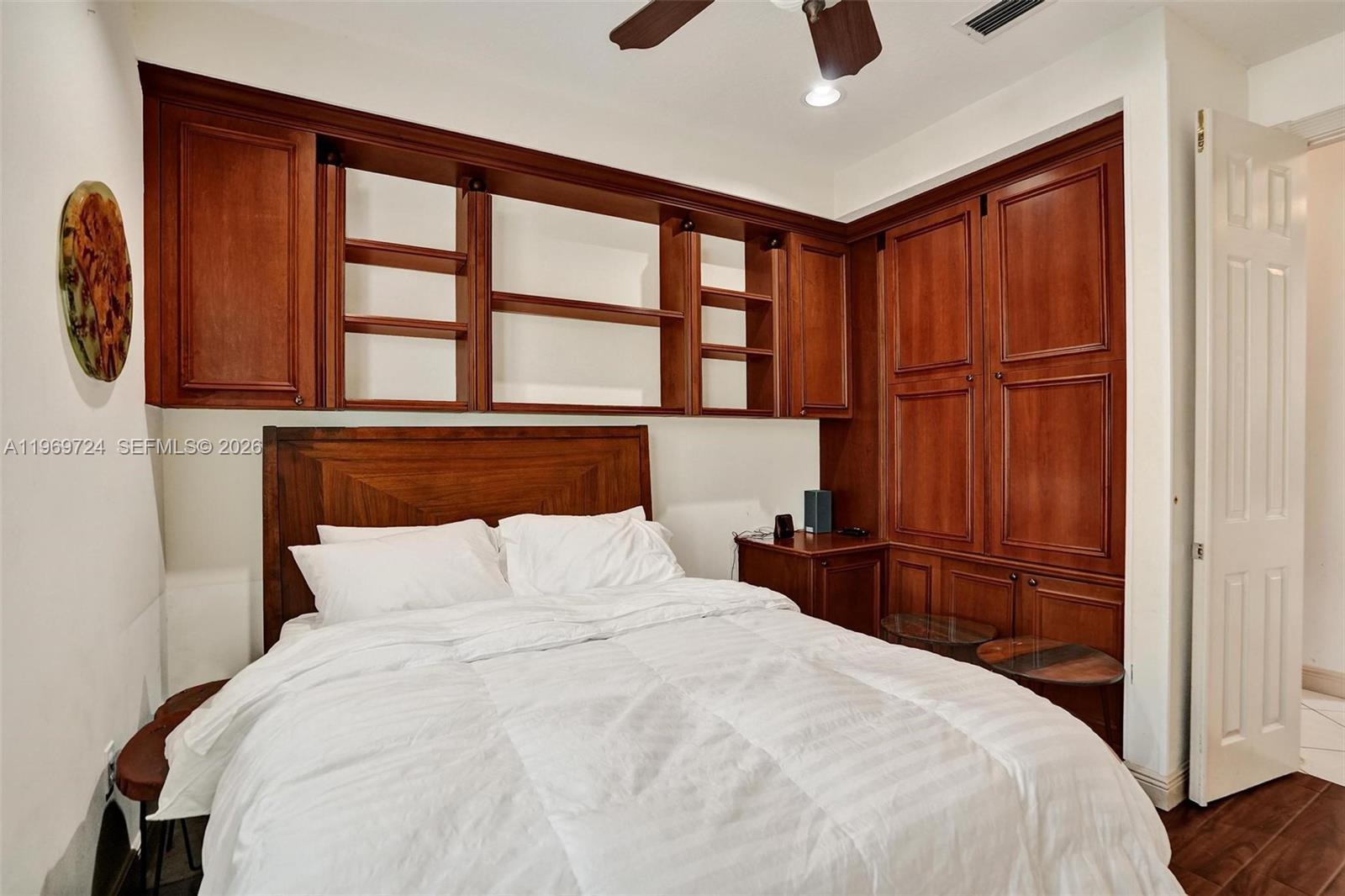 17431 Southwest 35th Street Miramar, FL 33029 - Photo 47 of 61 a bedroom with a large bed and a window