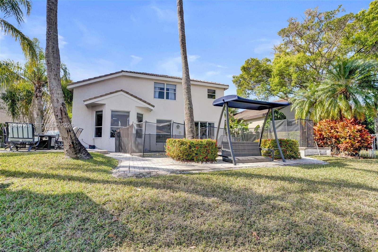 17431 Southwest 35th Street Miramar, FL 33029 - Photo 54 of 61 a view of a house with a yard