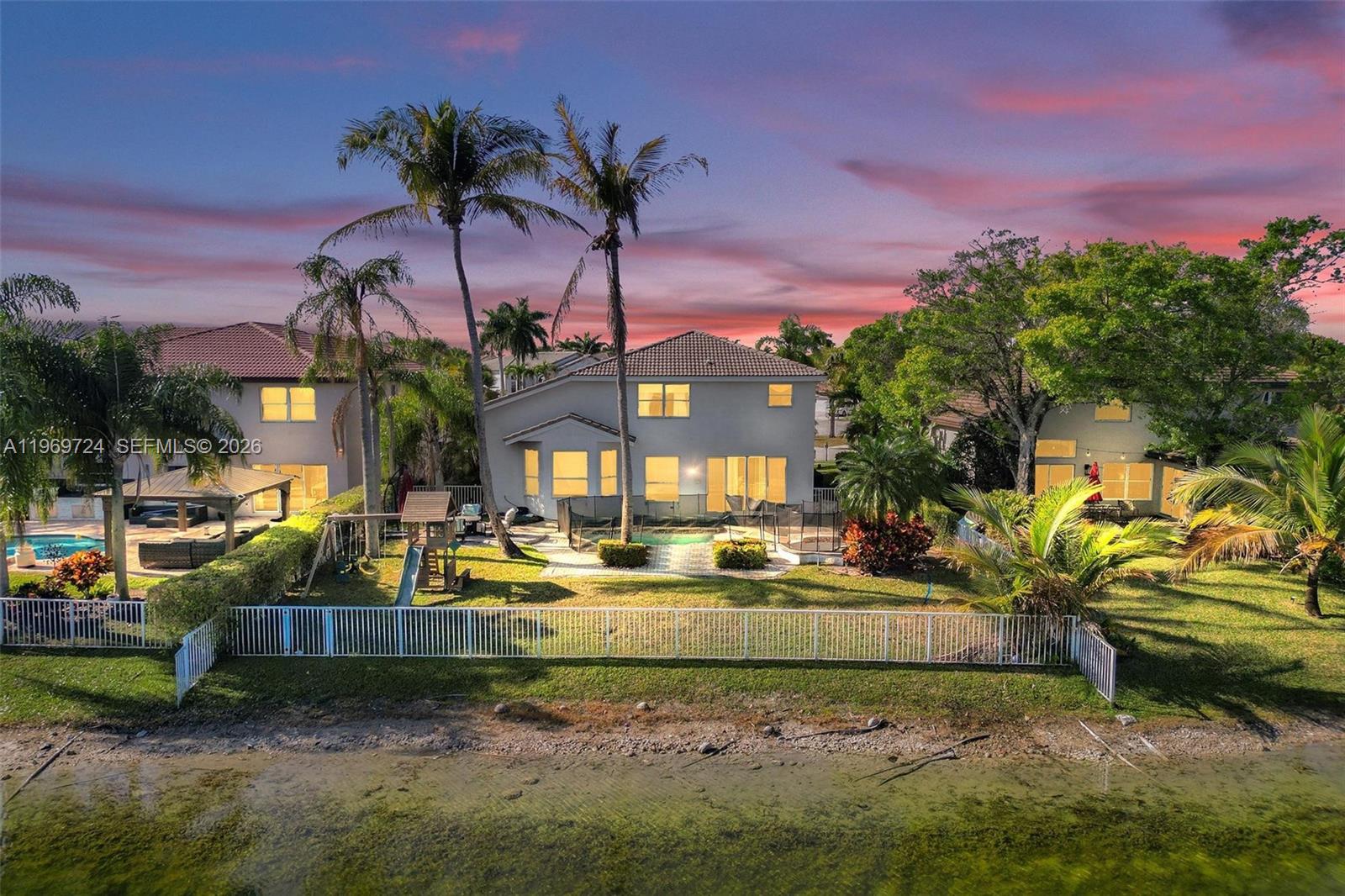 17431 Southwest 35th Street Miramar, FL 33029 - Photo 59 of 61 a view of a swimming pool with a patio