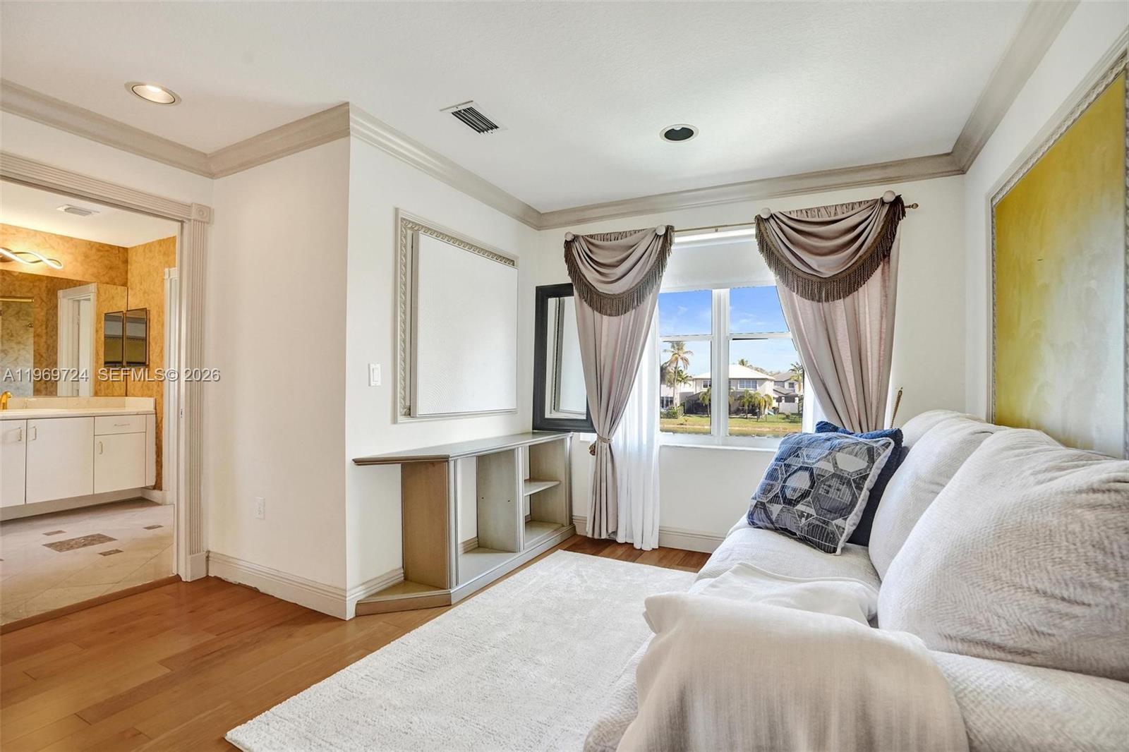 17431 Southwest 35th Street Miramar, FL 33029 - Photo 6 of 61 a bedroom with a bed and a window