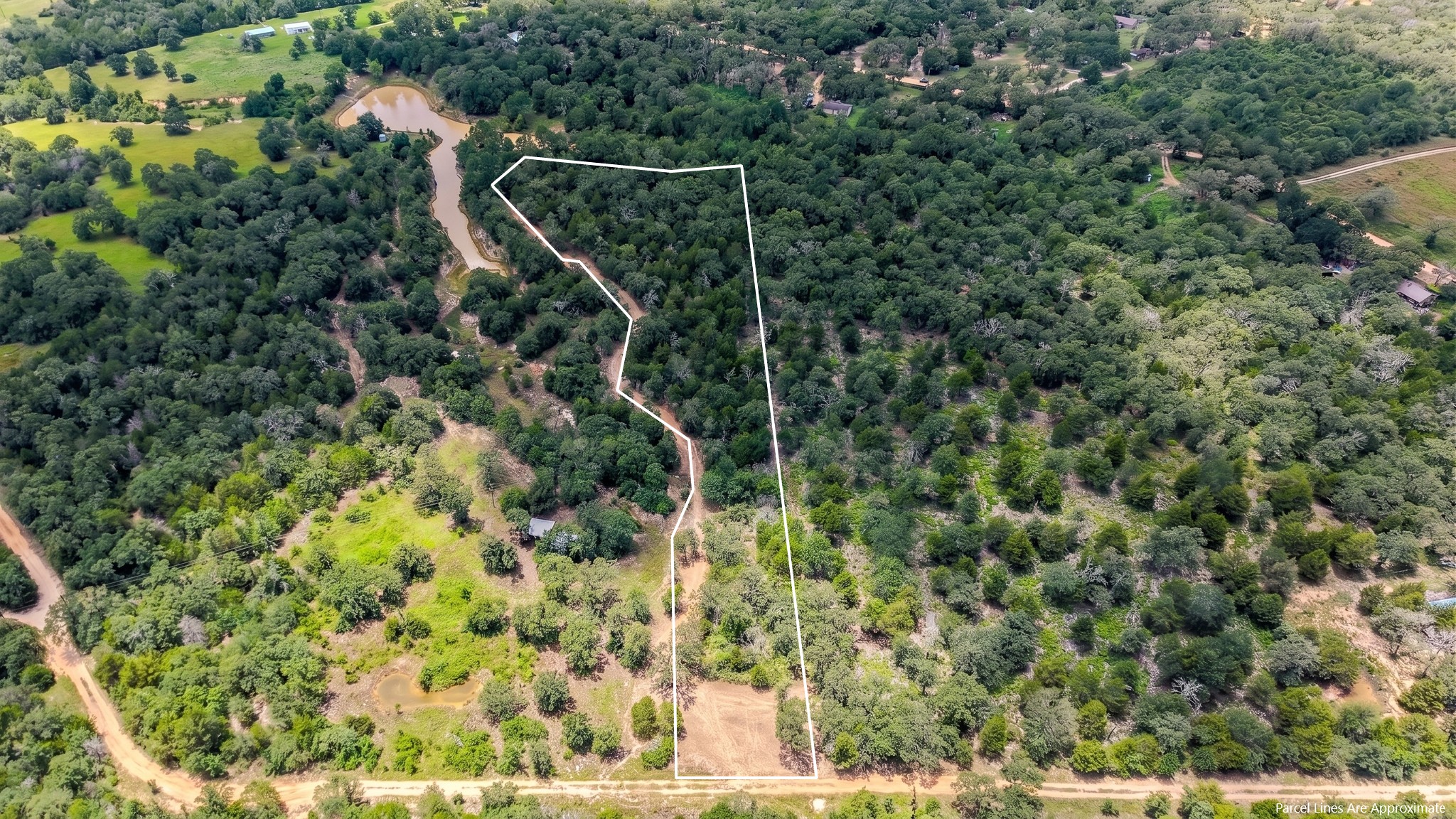 3428 (2.528 Acres In Lin Luce Ranches Milano, TX 76556 - Photo 20 of 23 Vast, verdant landscape offering a private pond and natural beauty for an idyllic retreat.