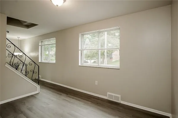 a view of entryway with wooden floor