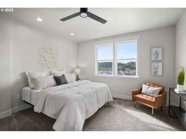 a bedroom with bed and a window