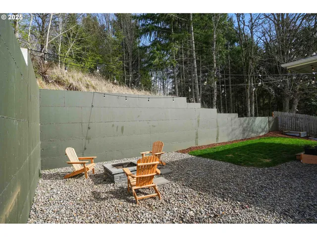 a view of a backyard with a small cabin