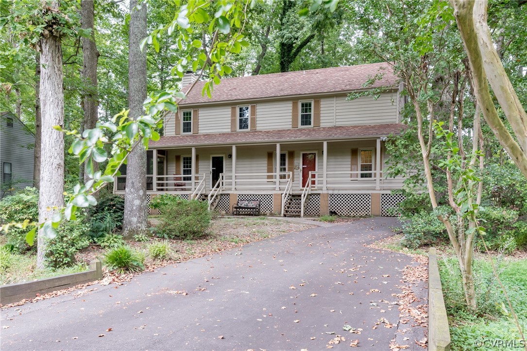 1400 Stone River Road North Chesterfield, VA 23235 - Photo 1 of 34 a front view of a house with yard and green space