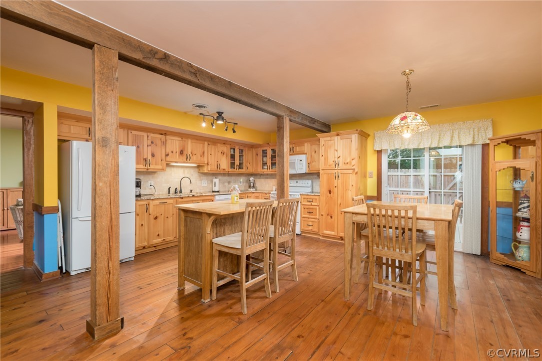 1400 Stone River Road North Chesterfield, VA 23235 - Photo 11 of 34 a dining room with furniture window wooden floor