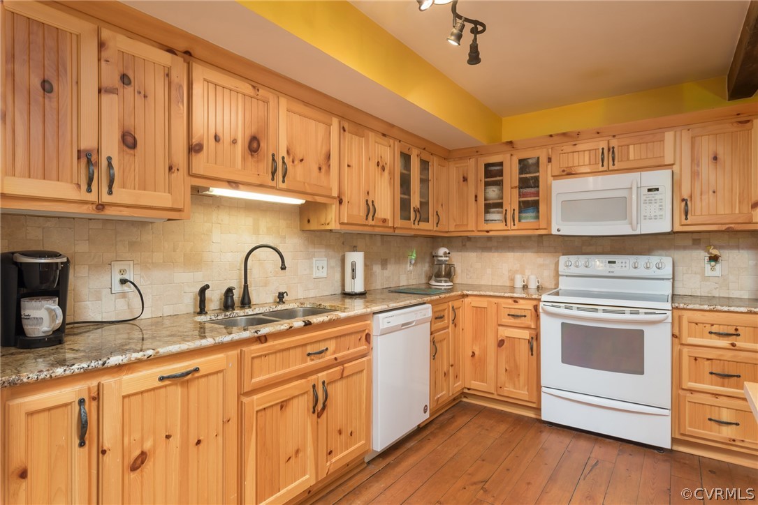 1400 Stone River Road North Chesterfield, VA 23235 - Photo 12 of 34 a kitchen with stainless steel appliances granite countertop a sink and cabinets with wooden floors