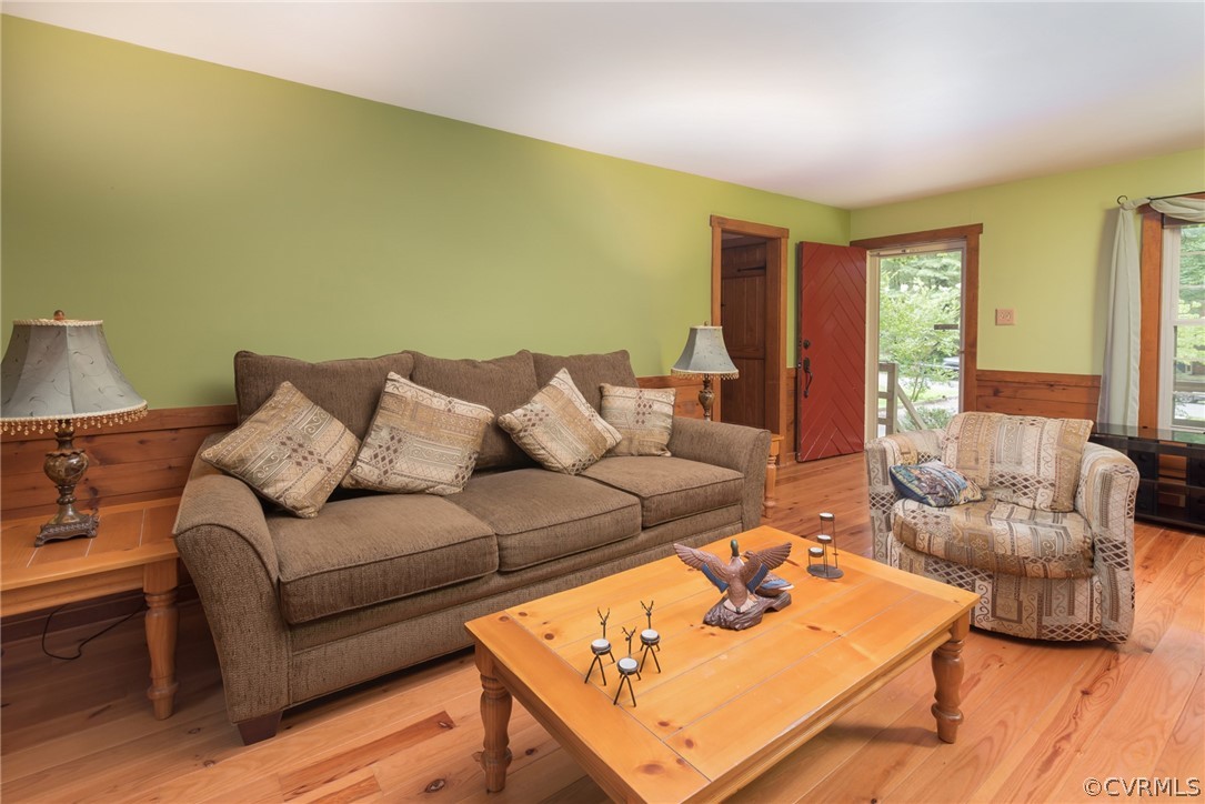 1400 Stone River Road North Chesterfield, VA 23235 - Photo 20 of 34 a living room with furniture and a wooden floor