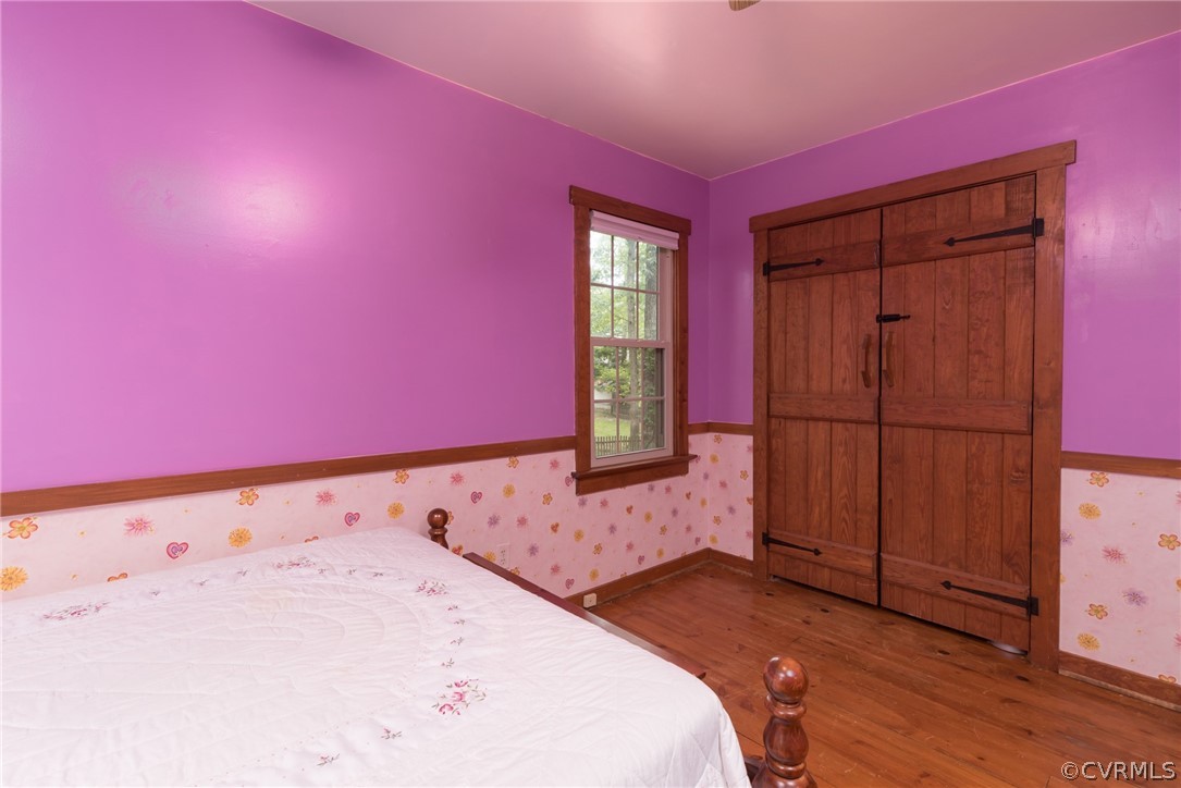 1400 Stone River Road North Chesterfield, VA 23235 - Photo 27 of 34 a view of a livingroom with wooden floor and cabinet