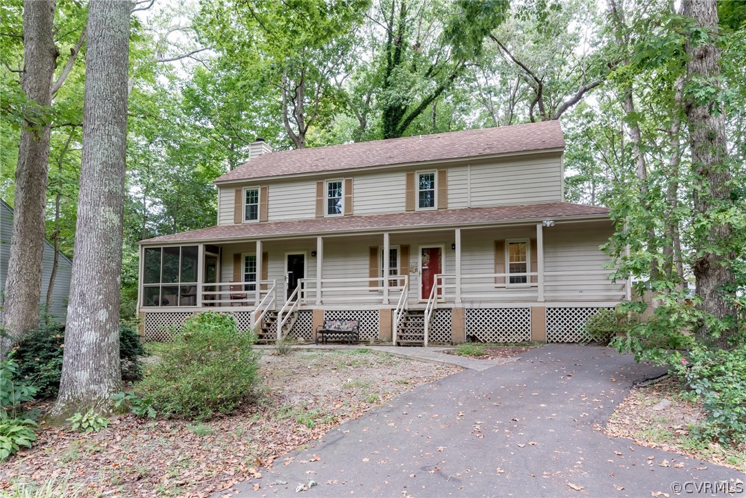1400 Stone River Road North Chesterfield, VA 23235 - Photo 3 of 34 a front view of a house with garden
