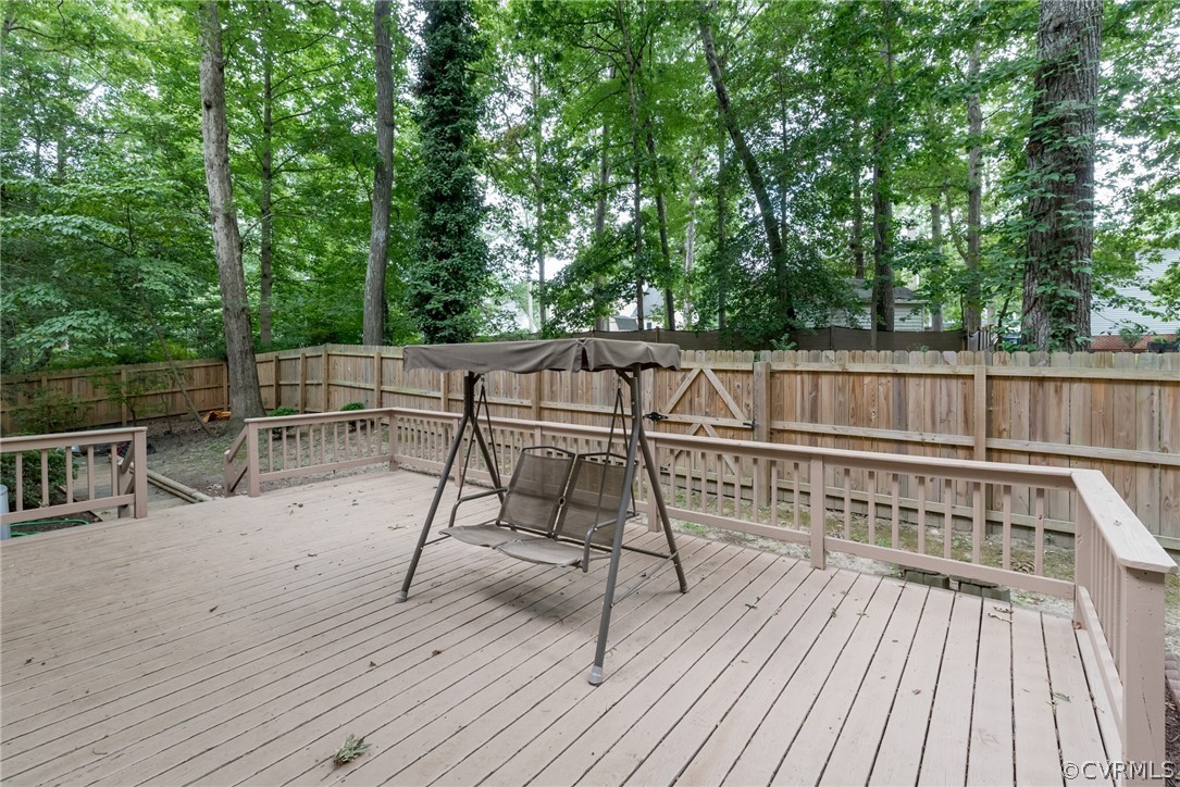 1400 Stone River Road North Chesterfield, VA 23235 - Photo 31 of 34 a view of backyard with deck and outdoor seating