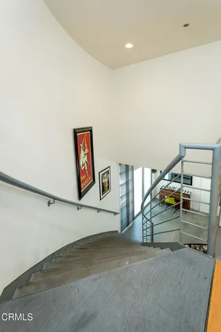 a view of a hallway with staircase