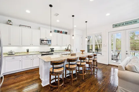 a view of a balcony with table and chairs