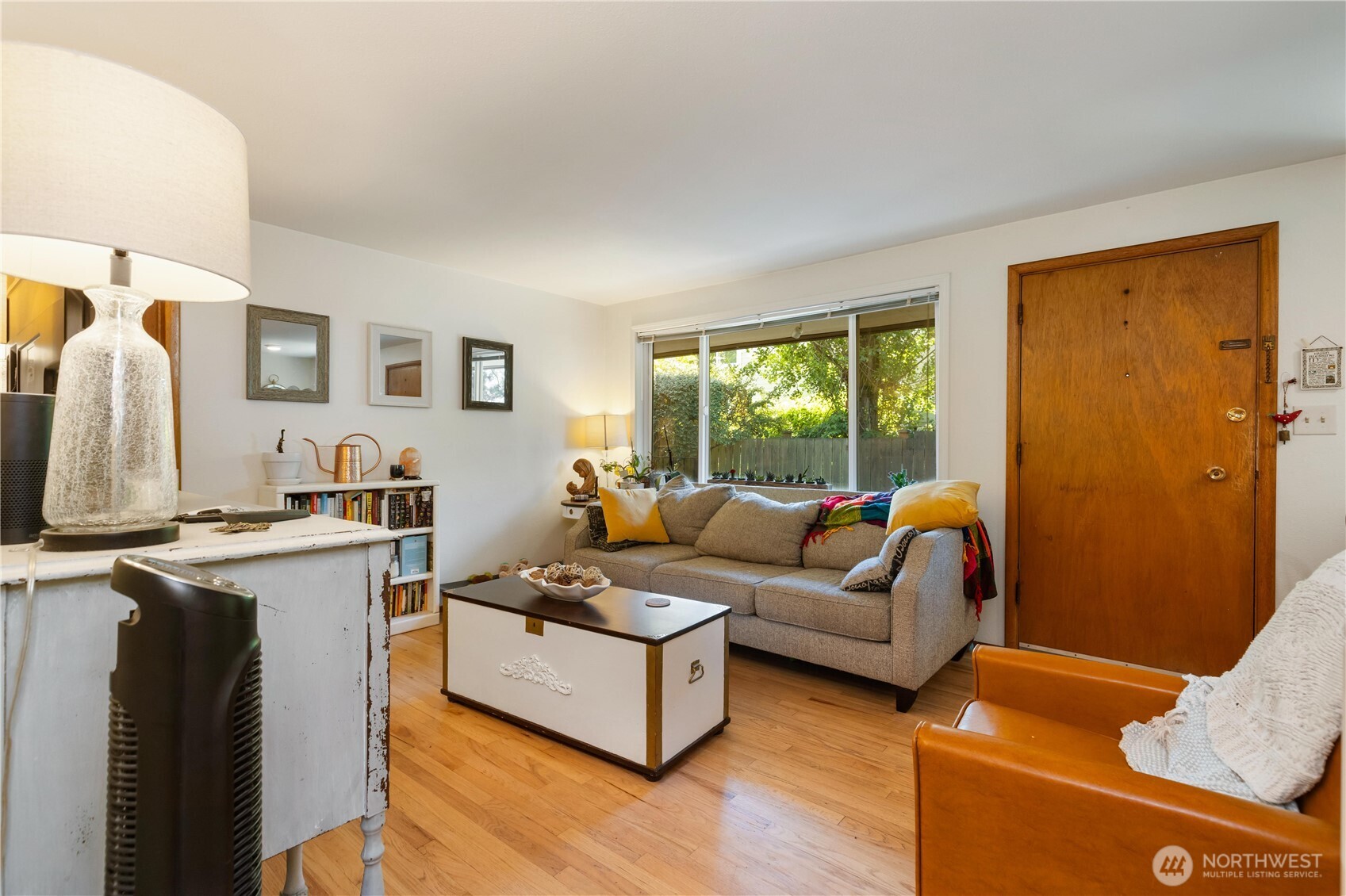 7343 35th Avenue Southwest Seattle, WA 98126 - Photo 17 of 36 a living room with furniture and a large window