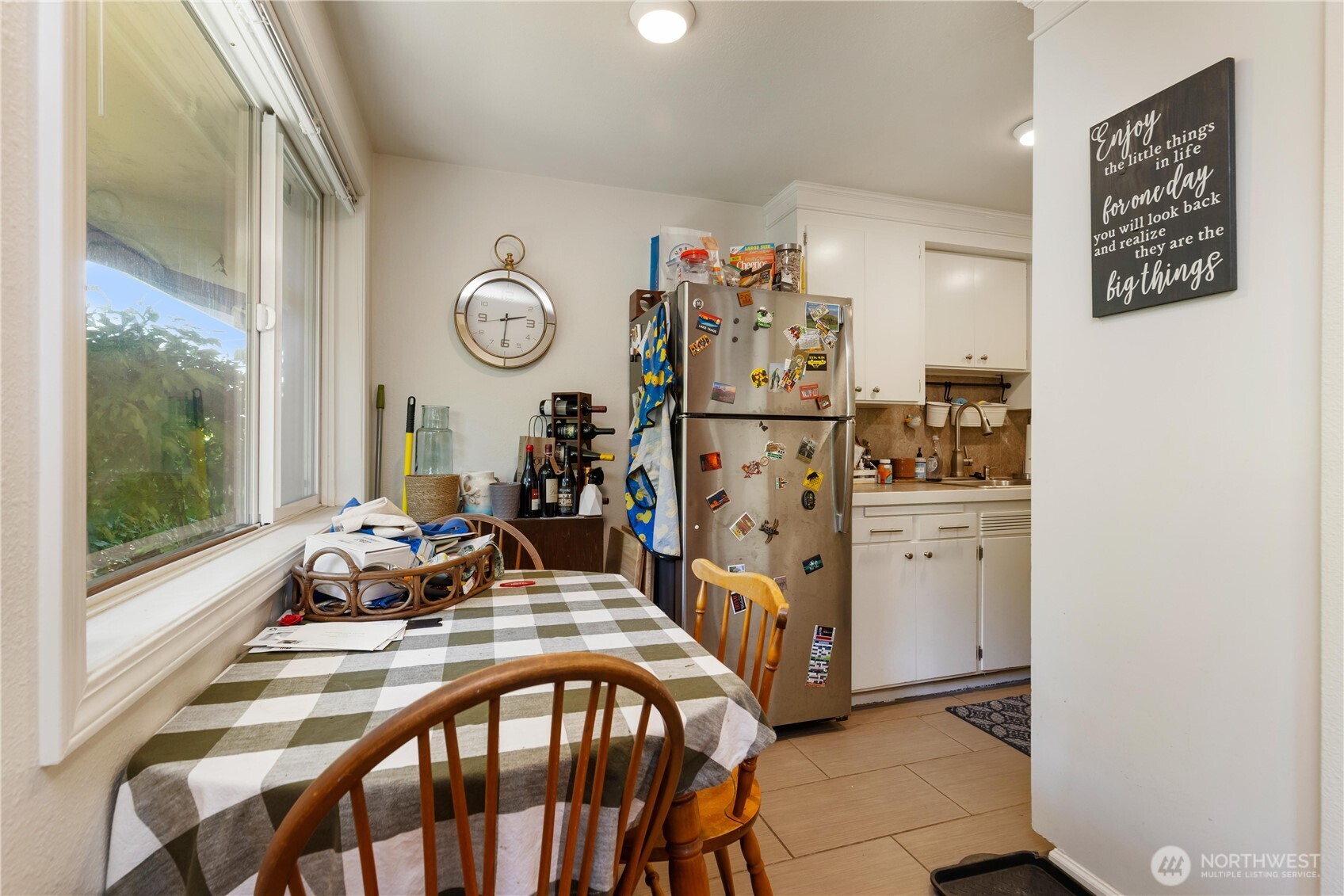 7343 35th Avenue Southwest Seattle, WA 98126 - Photo 18 of 36 a view of a dining table and chairs