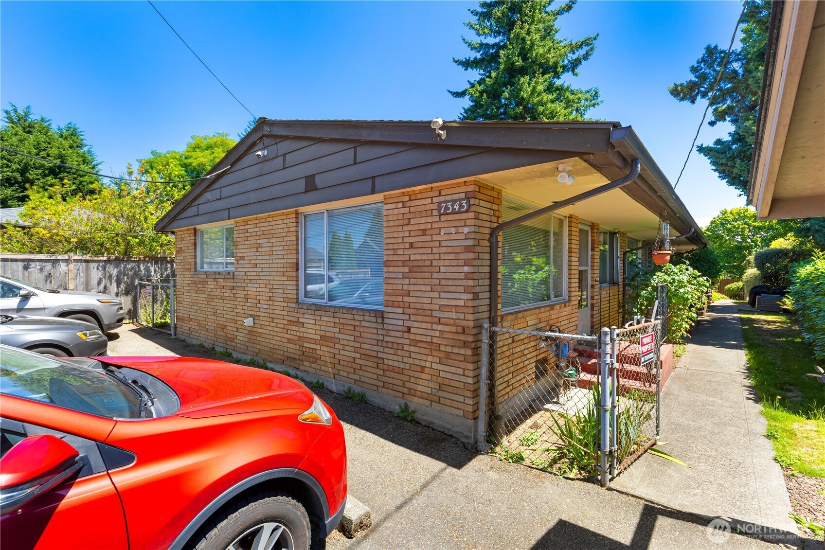7343 35th Avenue Southwest Seattle, WA 98126 - Photo 21 of 36 a backyard of a house with seating space