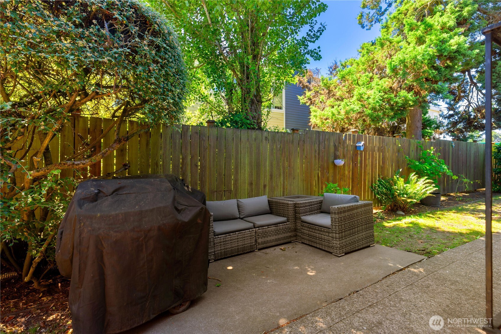 7343 35th Avenue Southwest Seattle, WA 98126 - Photo 27 of 36 a backyard of a house with seating space