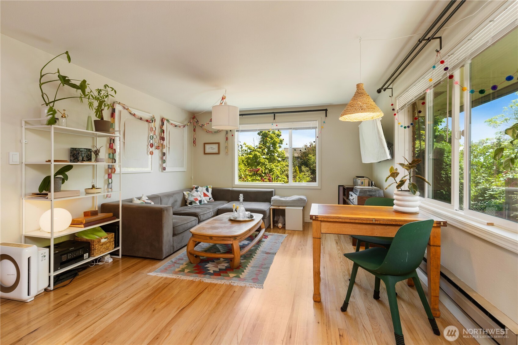 7343 35th Avenue Southwest Seattle, WA 98126 - Photo 8 of 36 a living room with furniture and a wooden floor