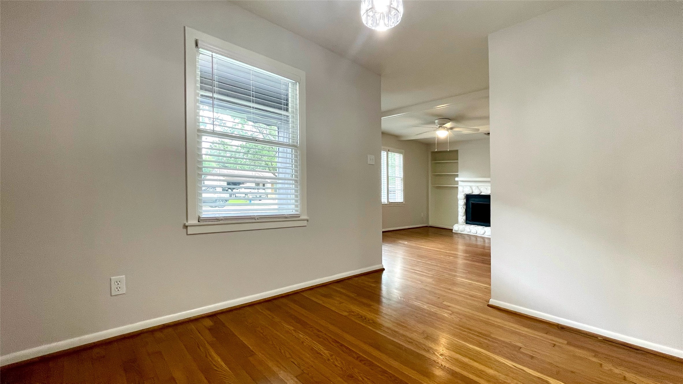 5905 Darnell Street Houston, TX 77074 - Photo 20 of 34 an empty room with wooden floor and windows