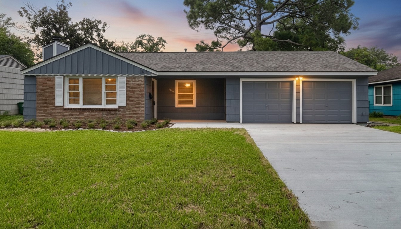 5905 Darnell Street Houston, TX 77074 - Photo 2 of 34 a front view of a house with a yard and garage
