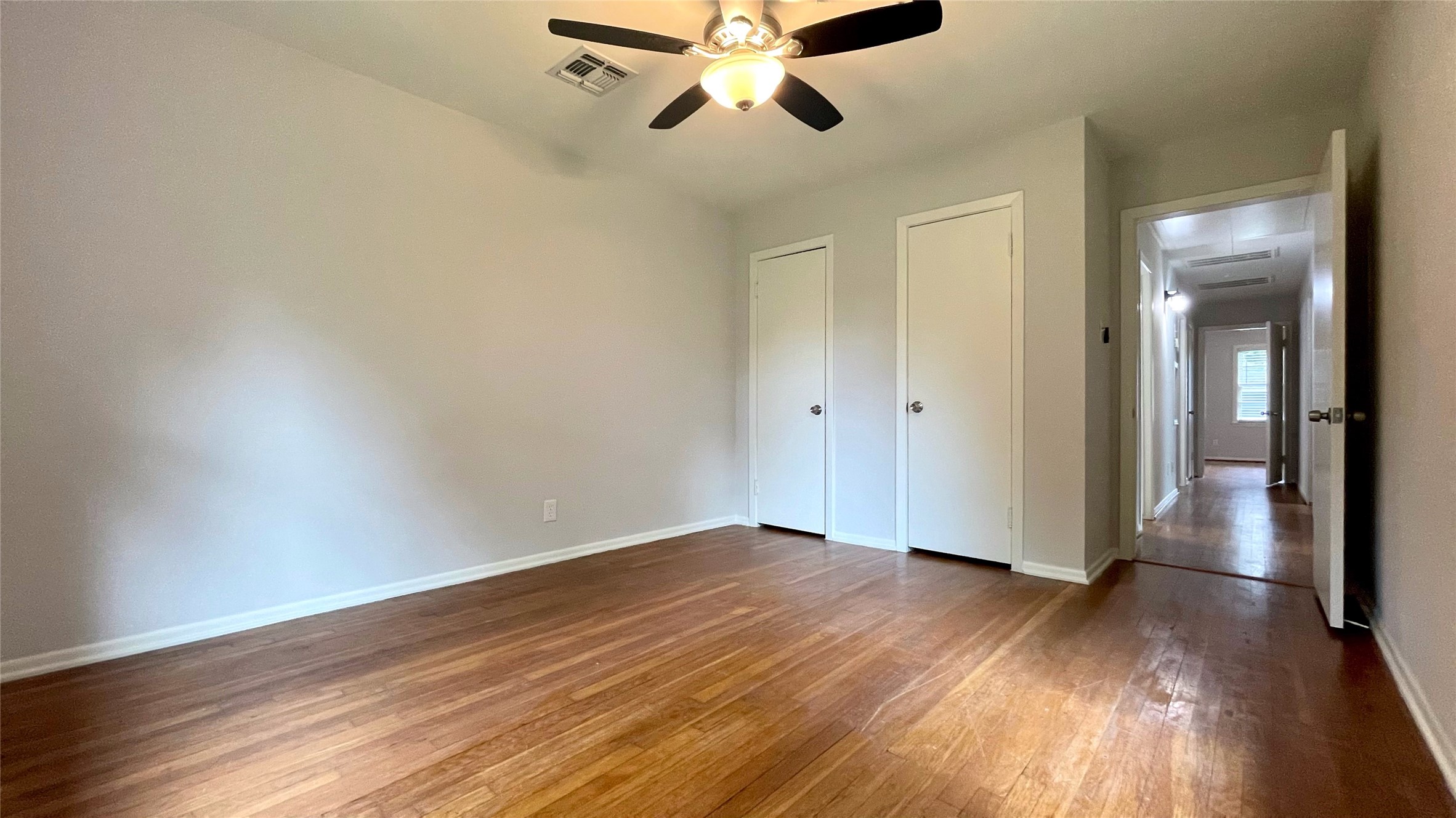 5905 Darnell Street Houston, TX 77074 - Photo 23 of 34 a view of empty room with wooden floor