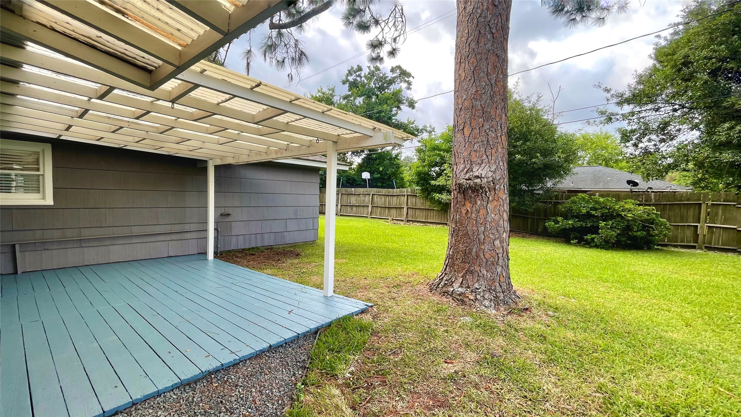 5905 Darnell Street Houston, TX 77074 - Photo 33 of 34 a view of a backyard with a small cabin