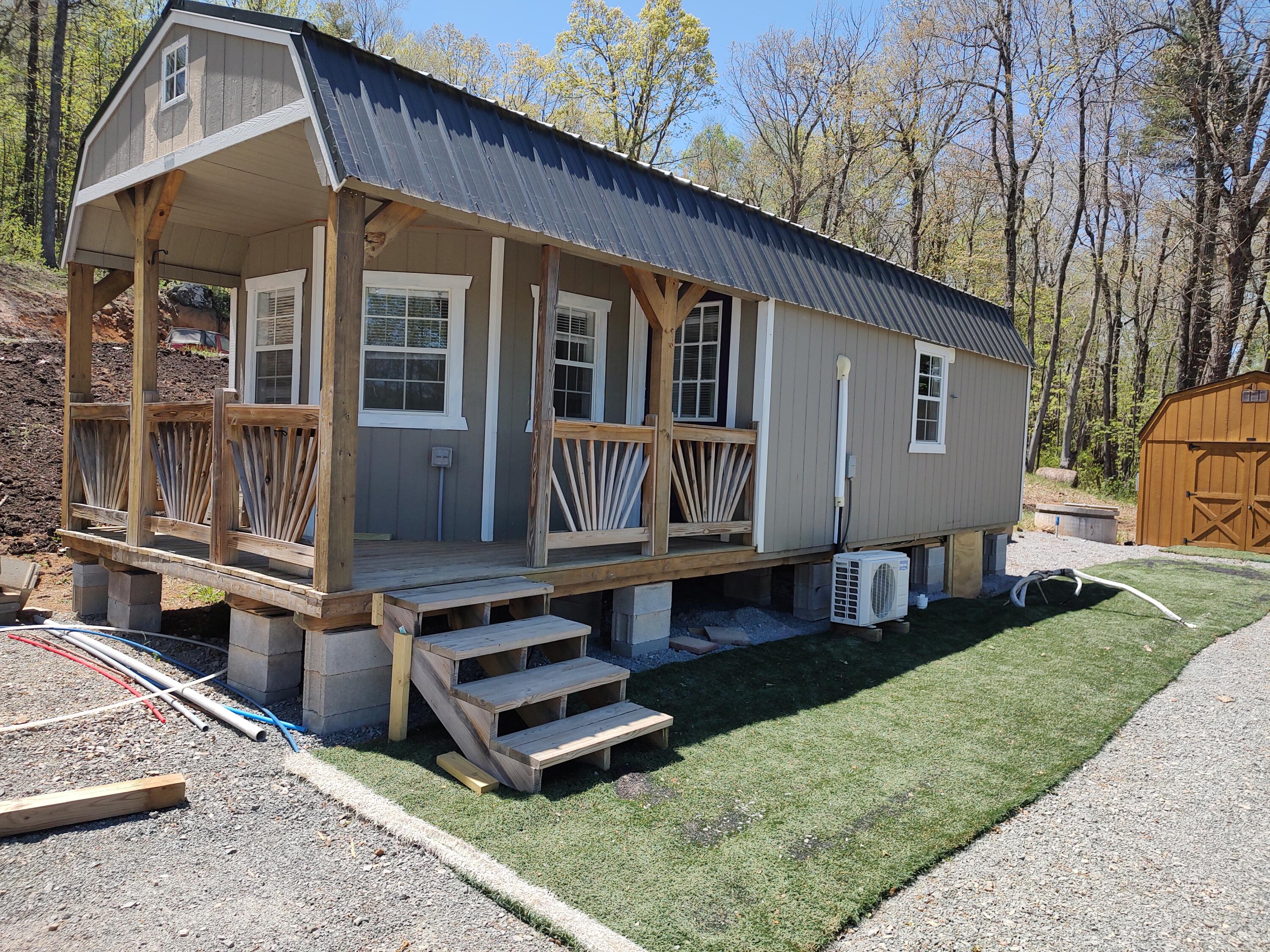 0 Park Ridge Lane Southeast Copper Hill, VA 24079 - Photo 11 of 12 a view of a house with backyard and sitting area