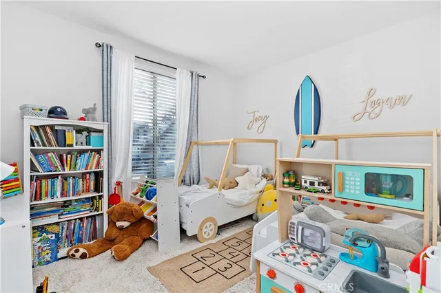 a room with furniture and a book shelf